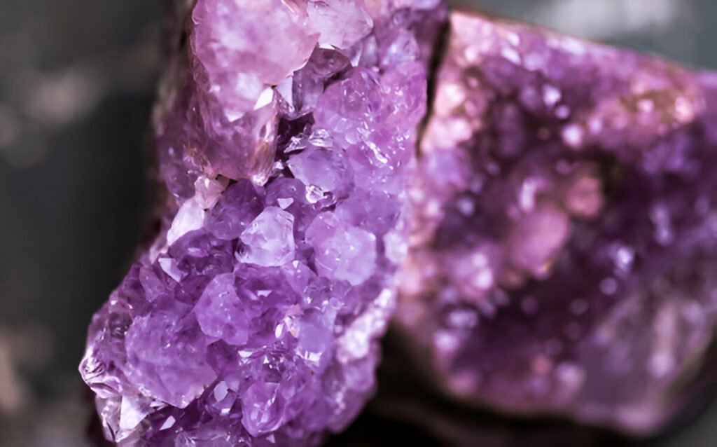 Colored crystals in a mineral close-up.