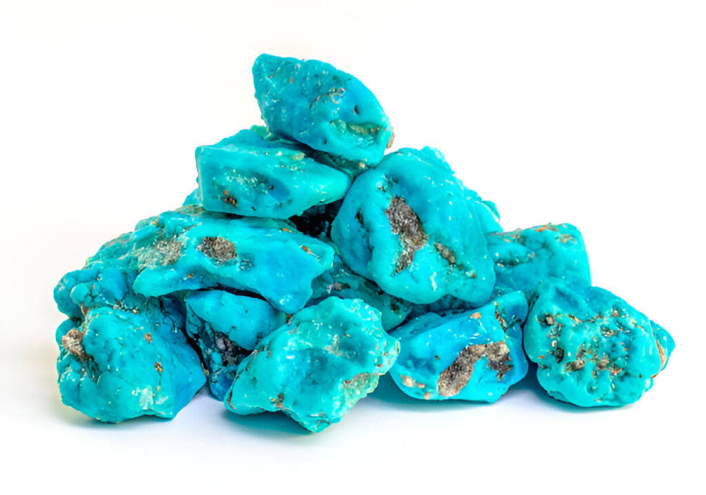 Turquoise stones heap on white