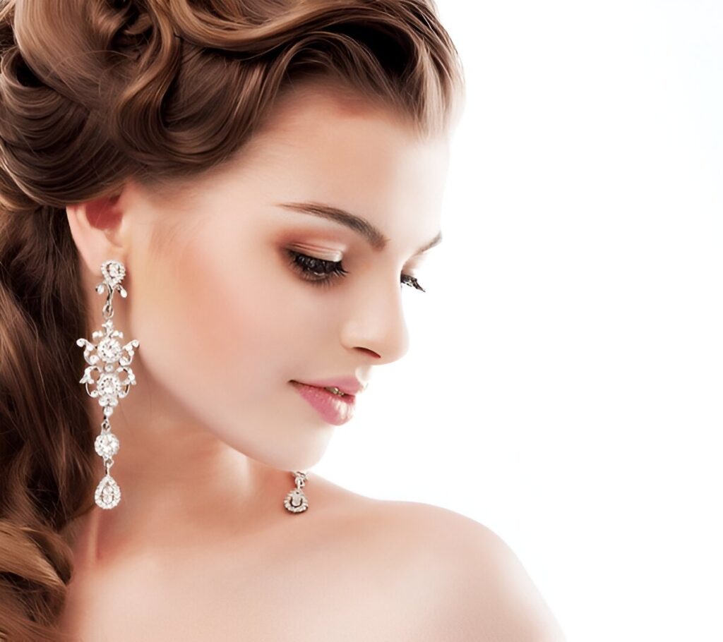 Pure Beauty. Aristocratic Profile of smiling bride with Glossy Diamond Earrings. Femininity & Sophistication